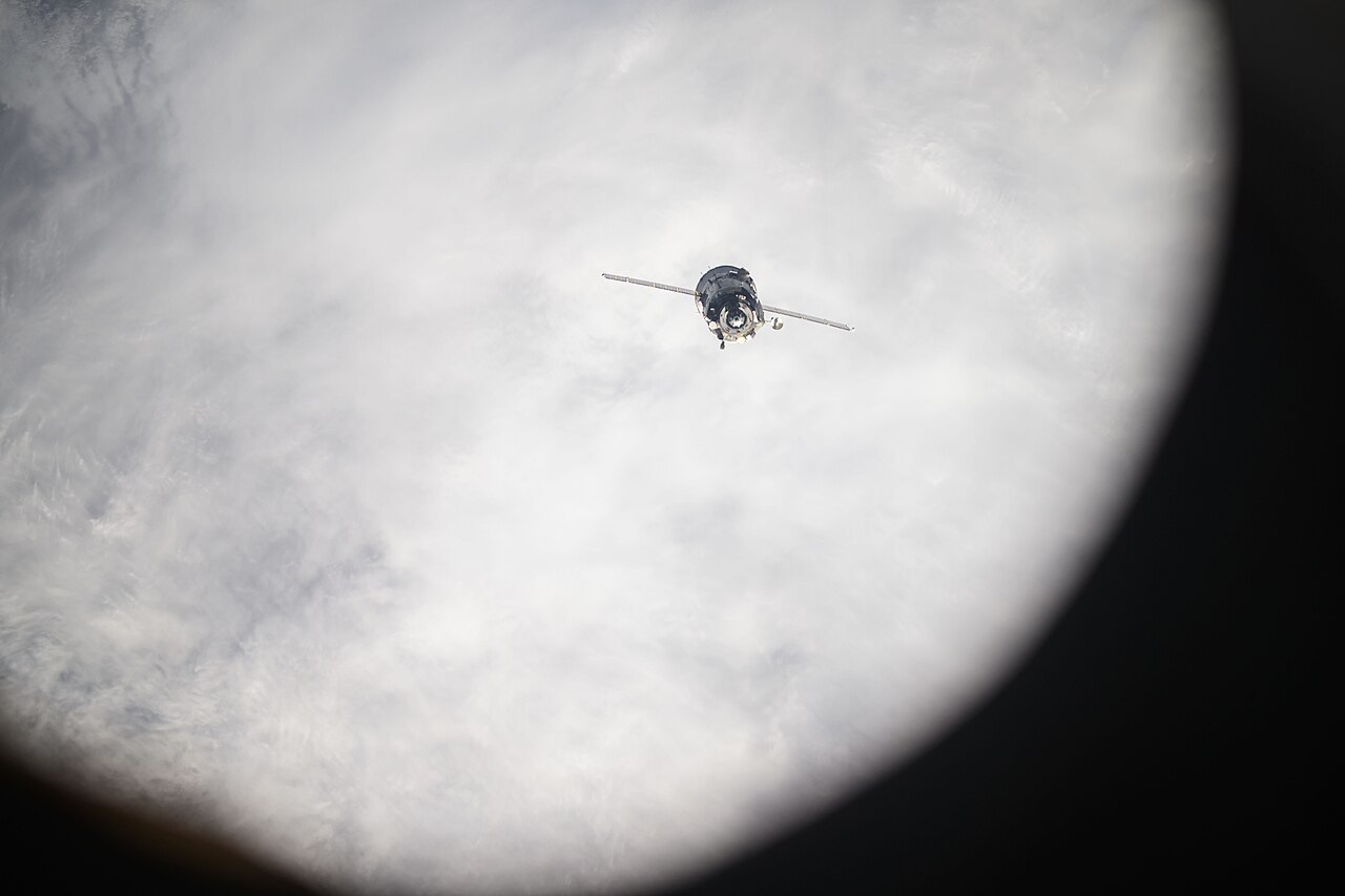 The Soyuz MS-26 spacecraft is pictured backing away from ISS shortly after undocking on April 19, 2025