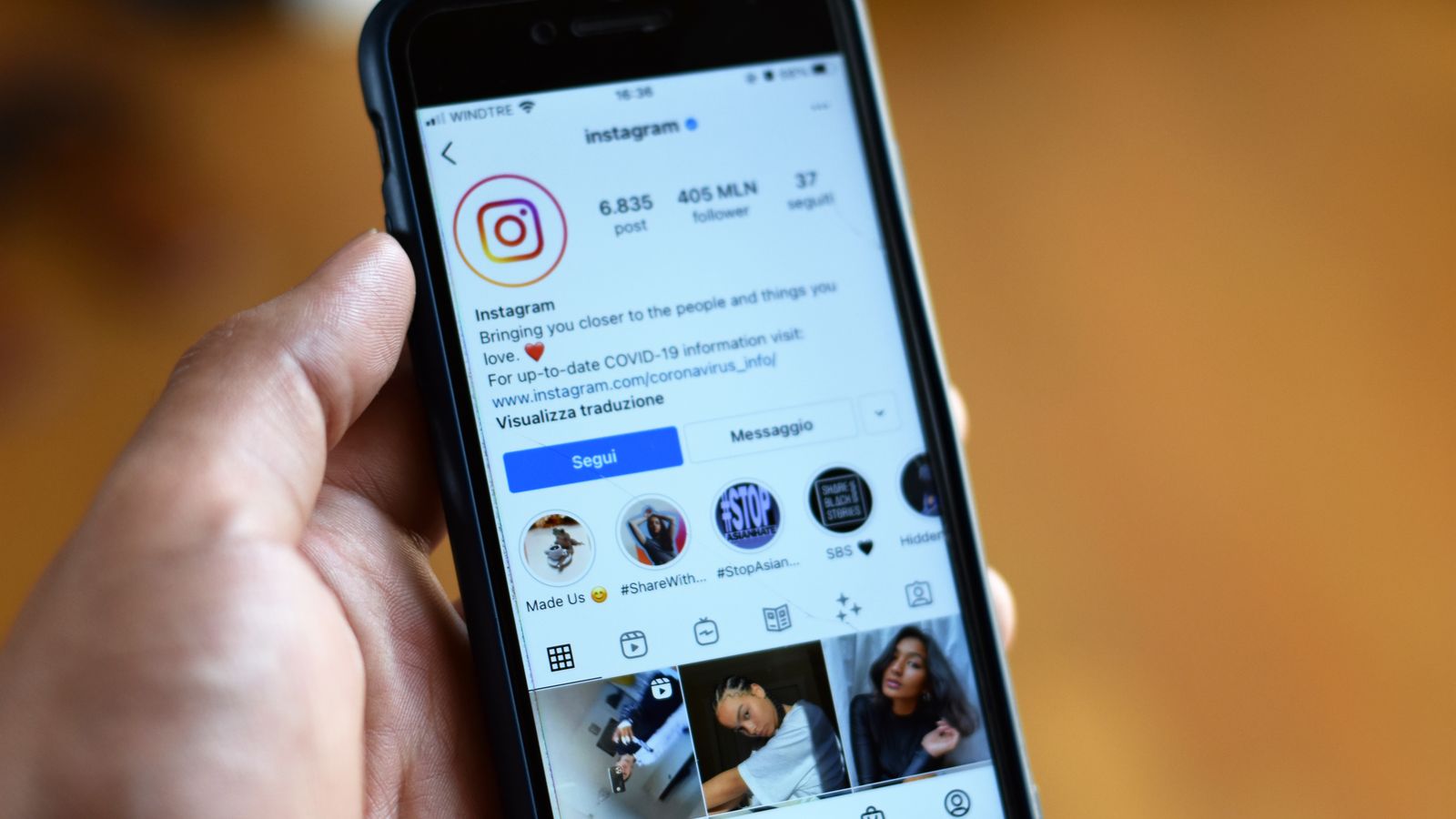 Close-up of a smartphone displaying an Instagram profile screen.