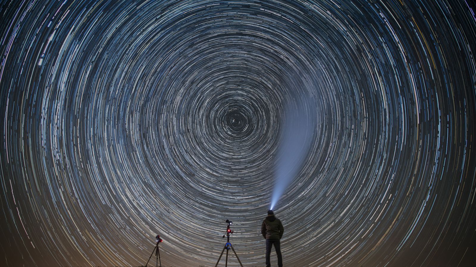 Stunning view of the Milky Way galaxy above a desert observatory under a starry night.