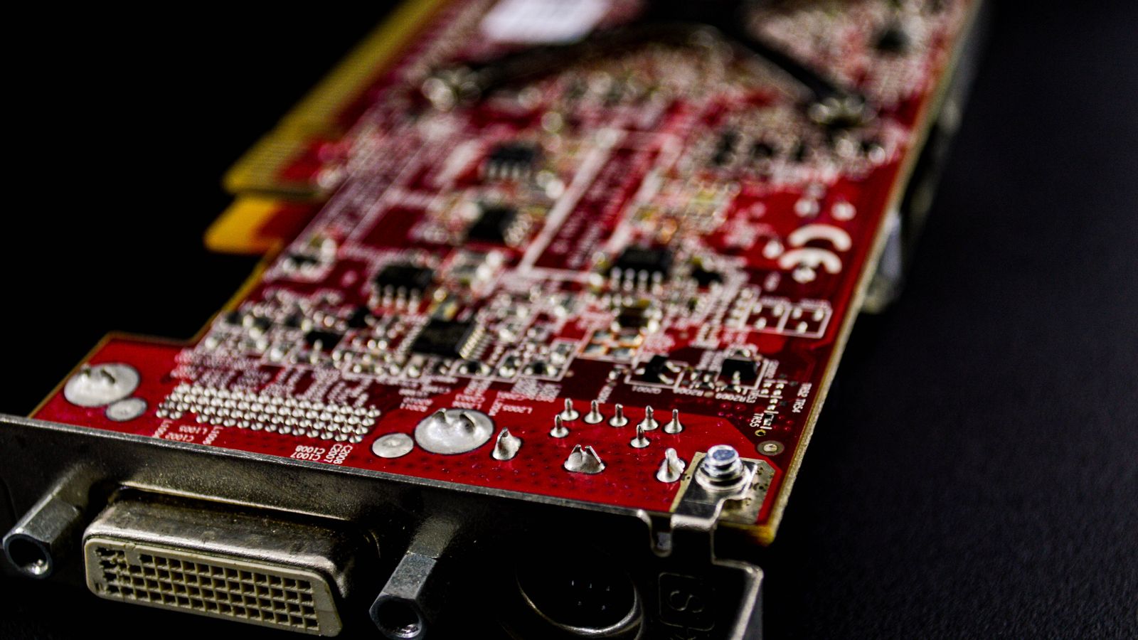 Detailed close-up view of a smartphone with a textured back cover emphasizing modern design and technology.