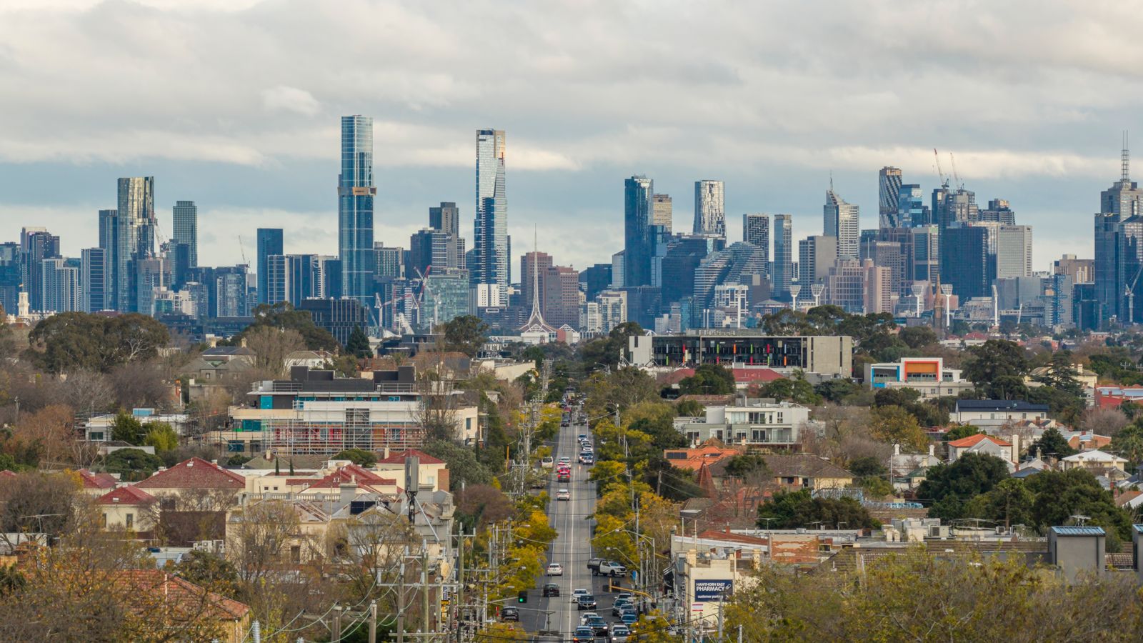 A view of Melbourne's skyline as seen from Hawthorn, showcasing prominent skyscrapers and urban landscape.