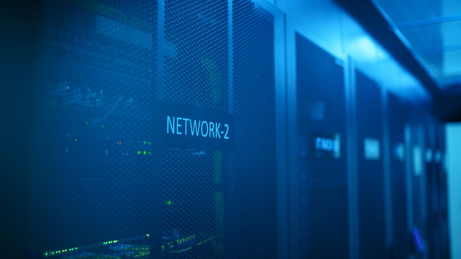 Network switches with status lights in a dark server rack