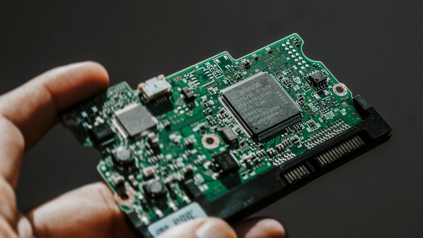 Close-up of vintage Intel 486DX2 CPU on a classic motherboard with electronic components.