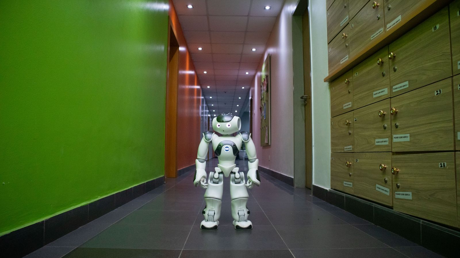 Close-up of a humanoid robot in motion, showcasing modern robotics innovation.