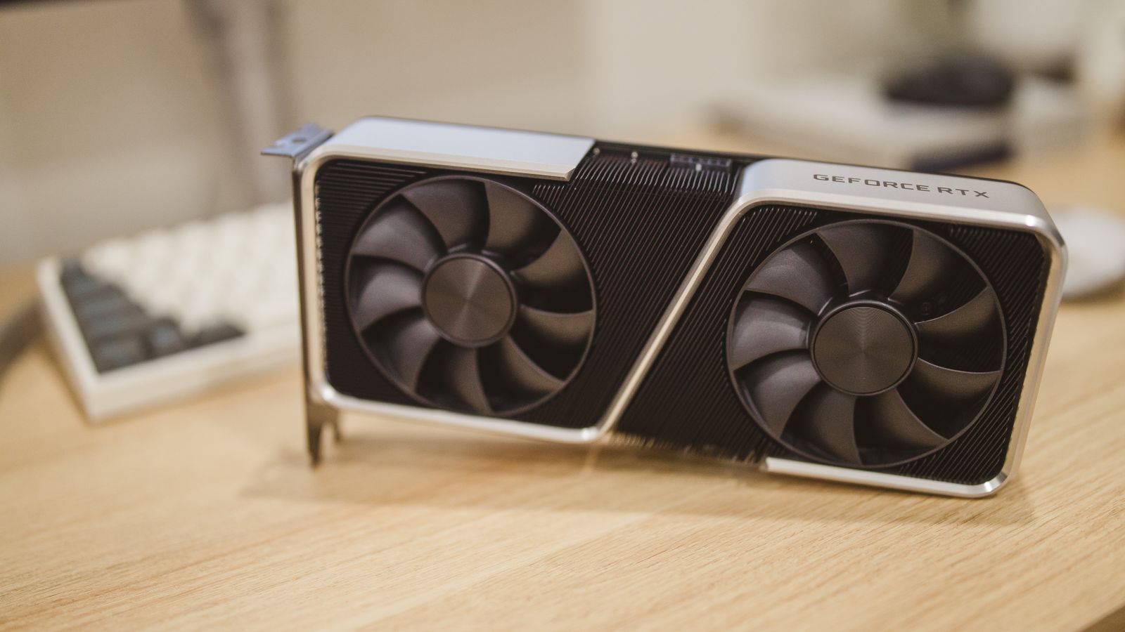 Close-up of two NVIDIA RTX 2080 graphics cards with dual fans, high-performance hardware.