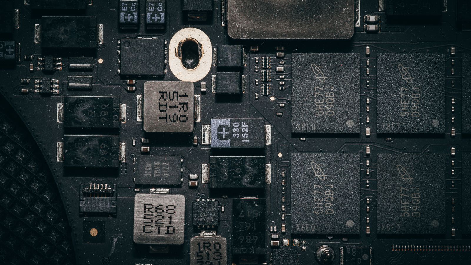 Detailed close-up of a computer circuit board highlighting electronic components and intricate design.